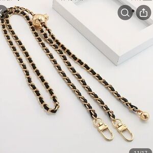 Black and gold purse crossbody strap